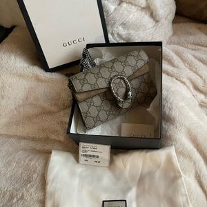 Brand New Gucci handbag w/ removable tassel.